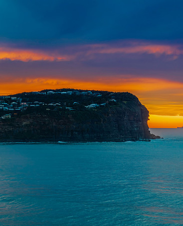 Cloud filled sunrise seascape
