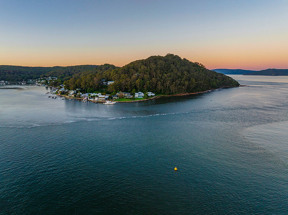 Aerial sunrise waterscape with clear skies