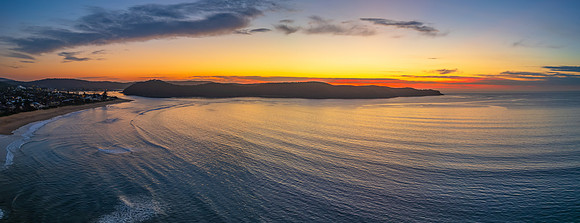 Sunrise seascape panorama with clouds