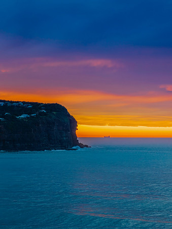 Cloud filled sunrise seascape