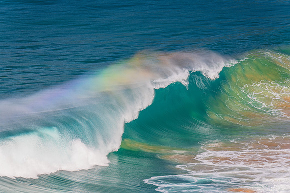 Rainbow light in the Waves at Whale Beach