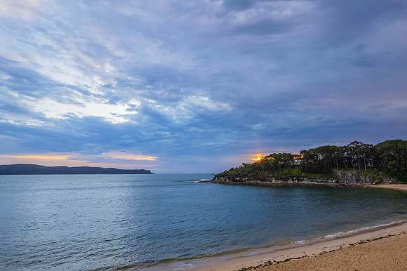 Cloudy sunrise seascape as a storm moves on