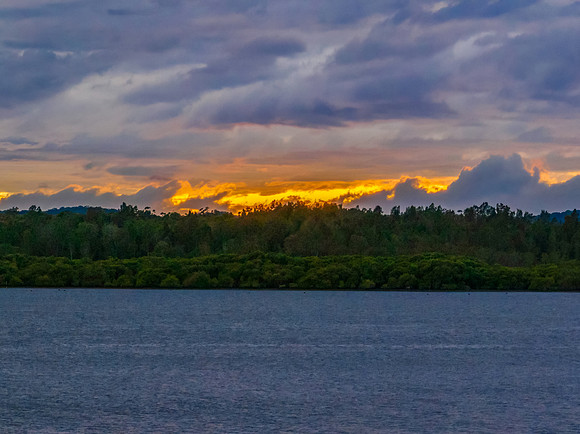 Stormy sunrise skies over the bay