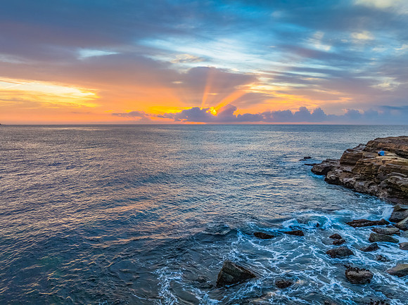 Aerial Sunrise Seascape Shrouded in Fog and High Clouds