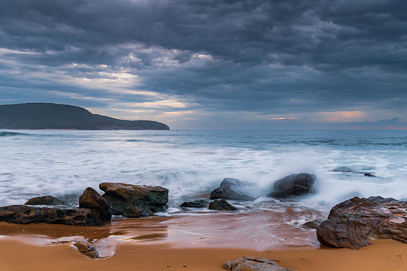 Sunrise at the seaside with rocks and beautiful diffused light