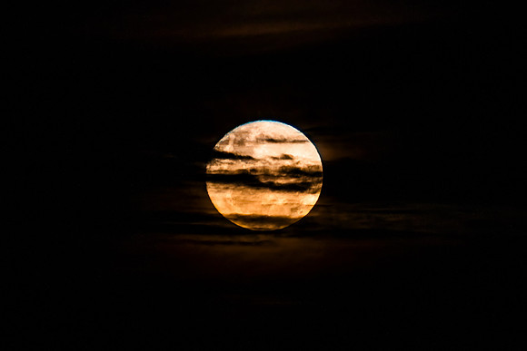 June's Full moon, Strawberry Moon with bands of clouds