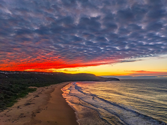 Winter seascape views over the beach with high and medium cloud