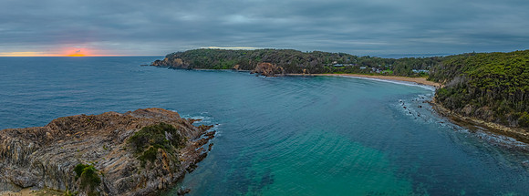 Cloud-covered sunrise panorama over Guerilla Bay