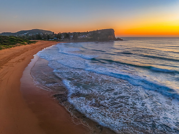 Sunrise at the Seaside with an Orange Horizon