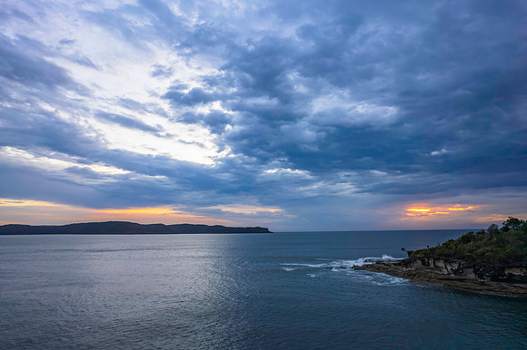 Cloudy sunrise seascape as a storm moves on