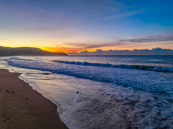 Sunrise seascape views with high cloud