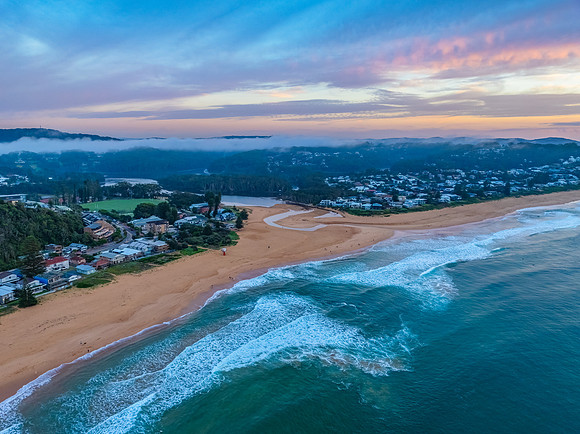 Aerial Sunrise Seascape Shrouded in Fog and High Clouds