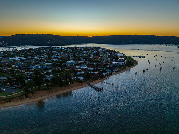 Aerial sunrise waterscape with clear skies
