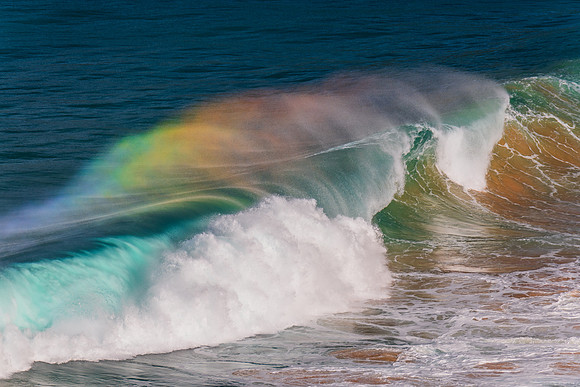 Rainbow light in the Waves at Whale Beach
