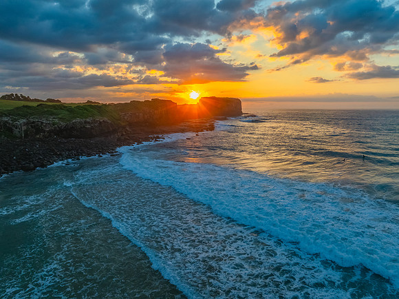 Aerial sunrise views over Bombo Beach at Kiama