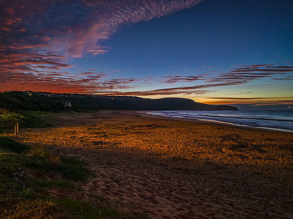 Winter dawn seascape over the beach with high and medium cloud c
