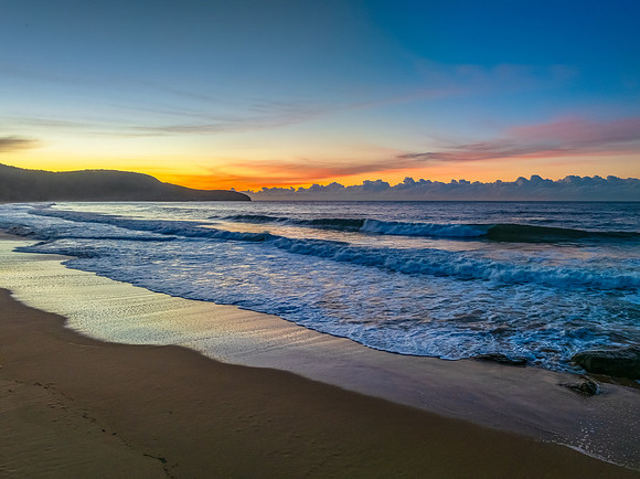 Sunrise seascape views with high cloud