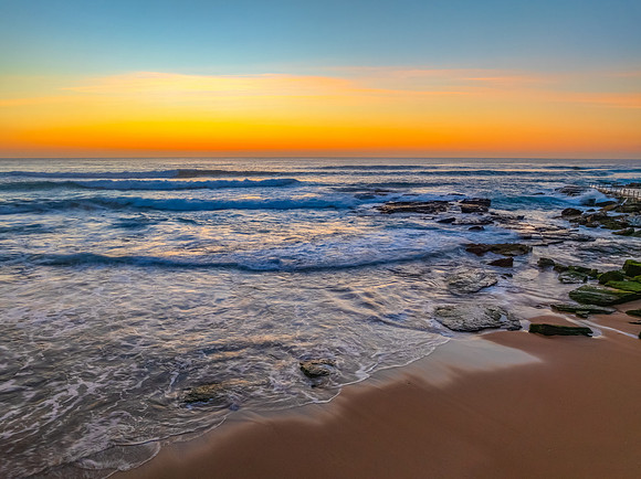 Sunrise at the Seaside with an Orange Horizon