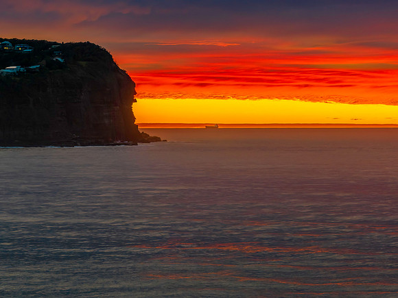 Cloud filled sunrise seascape