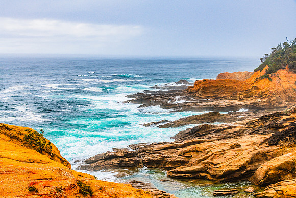 Overcast morning seascape with rocky headland at Bermagui
