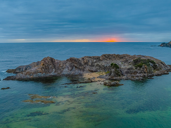 Cloud-covered sunrise over Guerilla Bay