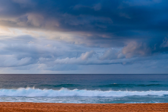 Sunrise at the Seaside with rain clouds