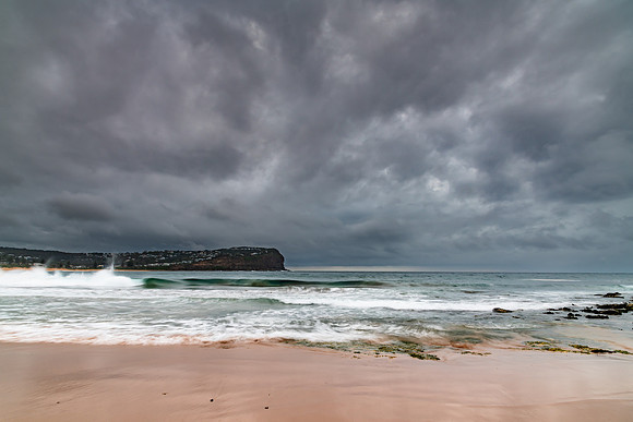 Rainy day sunrise at the beach