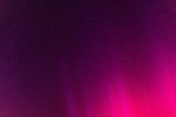 Aurora Australis vibrant display lights up the predawn sky in pi