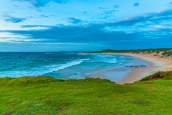 Sunrise seascape with strong southerly winds