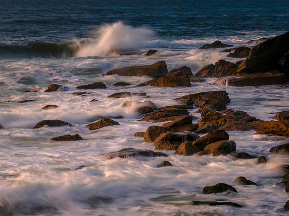 Sea and rocks in the sunrise light
