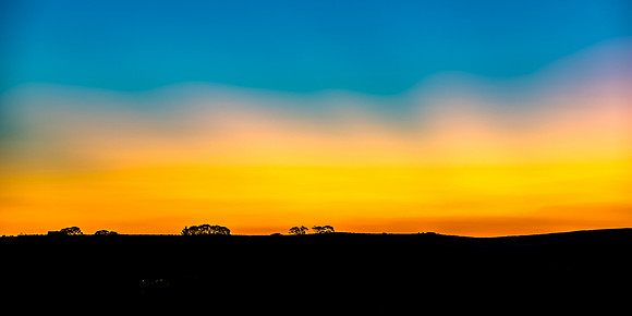 After Sunset, Nightfall falls over the town