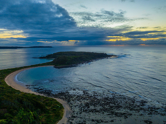 Sunrise with clouds and rocks