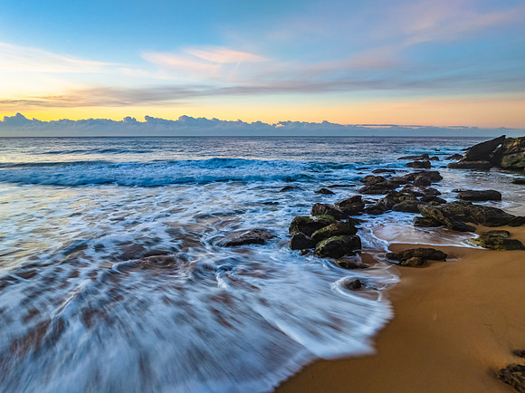 Sunrise seascape views with high cloud