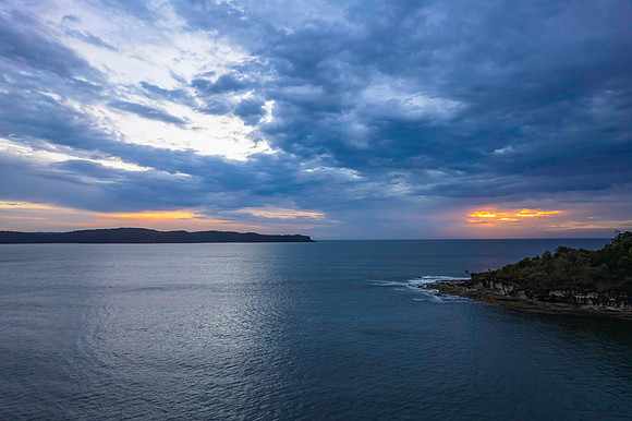 Cloudy sunrise seascape as a storm moves on