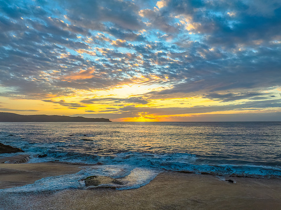 After the rain sunrise at the seaside