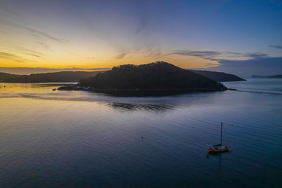 Aerial sunrise waterscape with boats