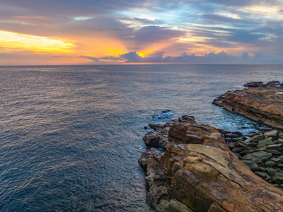 Aerial Sunrise Seascape Shrouded in Fog and High Clouds