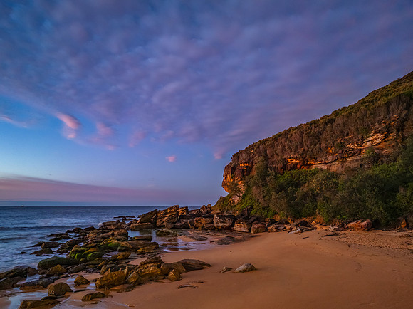 Winter seascape views over the beach with high and medium cloud