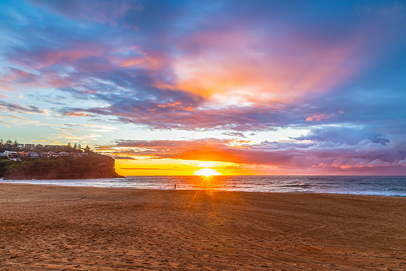 Sunrise at the Seaside with rain clouds